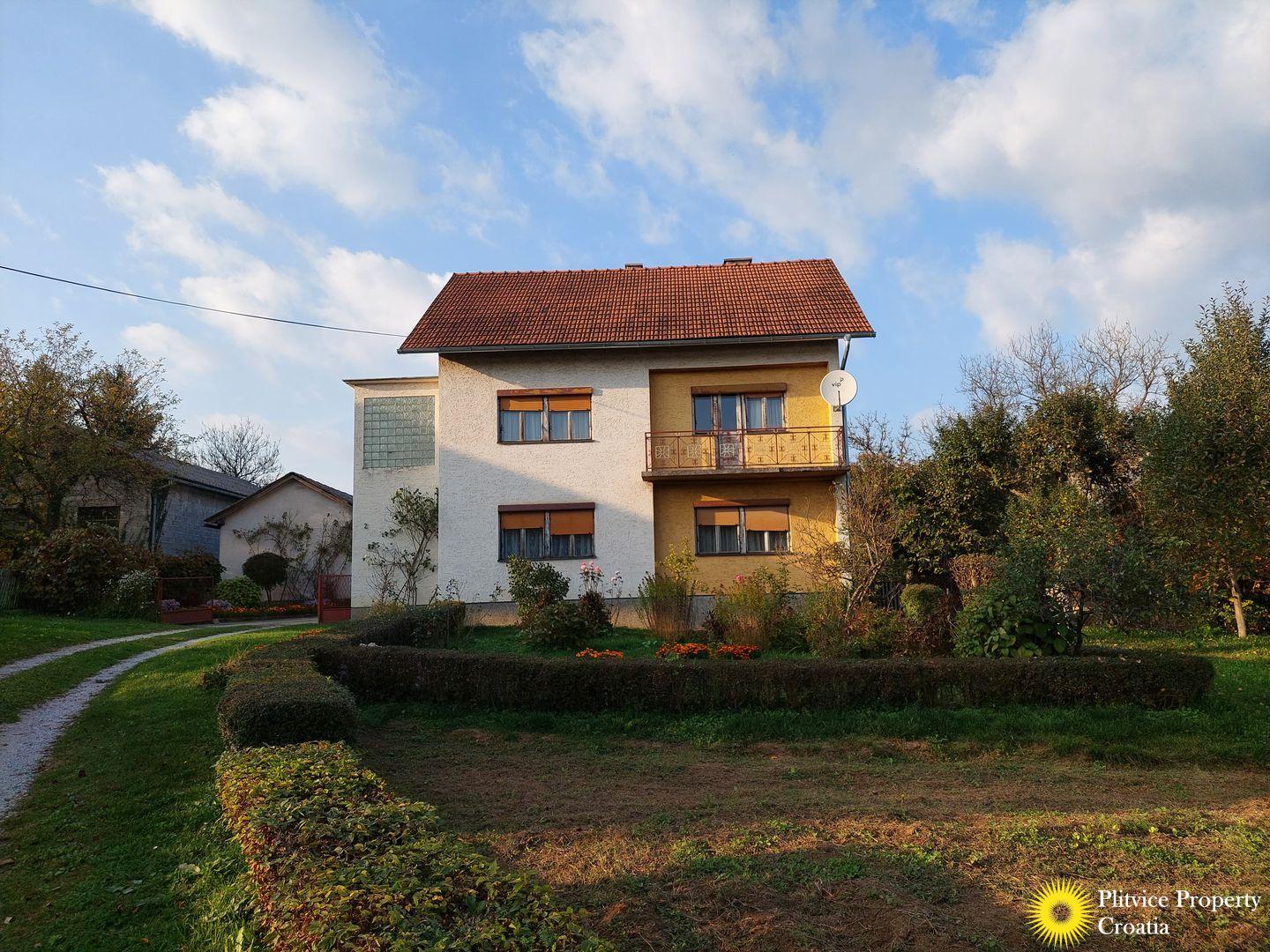 Twostorey house with an orchard and a courtyard Real Estate Croatia